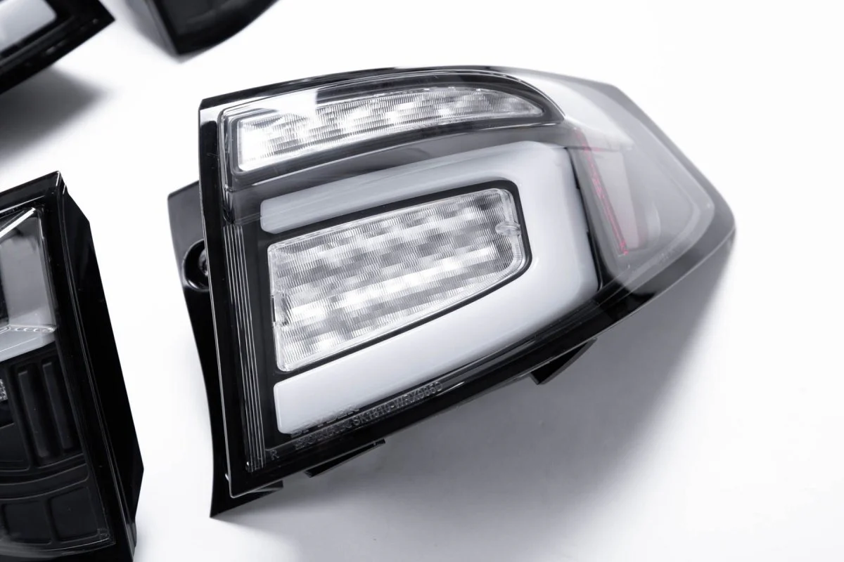 Spyder Sequential LED Tail Lights Black Housing w/ Clear Lens and White Bar 2008-2014 WRX Hatchback / 2011-2014 STI Hatchback - Image 3